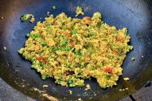 photo of Vegetable Pilau Rice in a wok on the bbq
