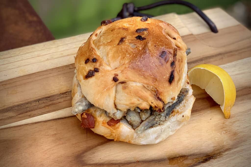 Whitebait in a chorizo and onion roll