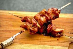 photo of Yakitori Skewers crossed on a board