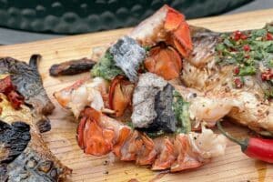 photo of Lobster Tails with Herby Butter on a board