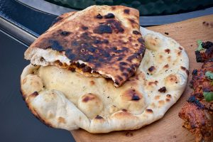 Keema naan photo of Keema naan on a board