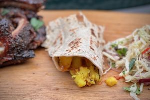Indian Chip Butty photo of an Indian Chip Butty on a board