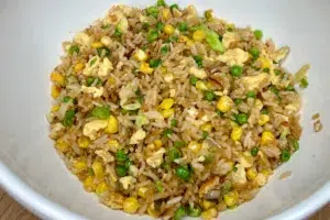 Egg and veg fried rice photo of Egg and veg fried rice in a white bowl