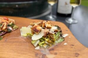 photo of Chicken Caesar Salad on a slather board