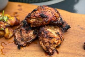photo of Jerk Chicken Thighs on a board