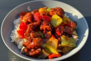 photo of cooked Sweet chilli chicken in a bowl
