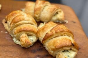 Cheese & Jalapeño Popper Croissants on a slather board