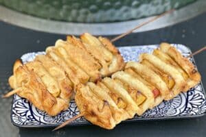Apple Pie Skewers on blue and white dish